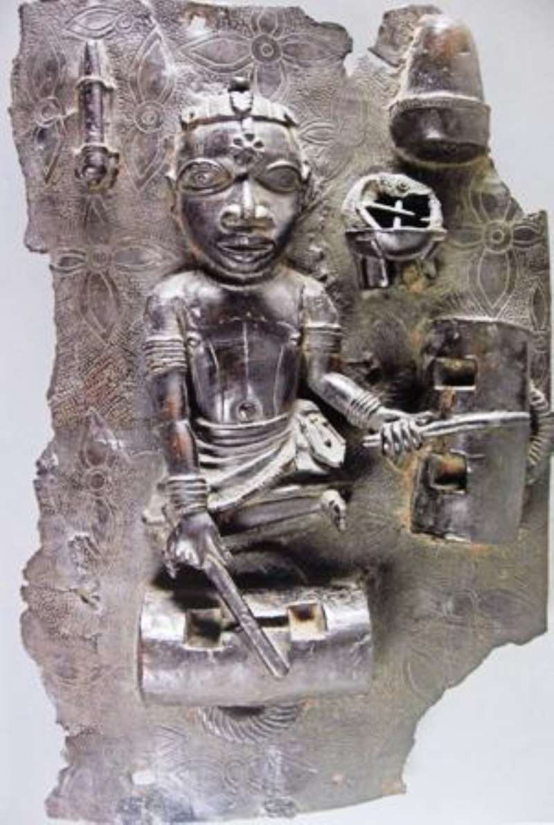 Relief Plaque, Drummer with slit drums, Benin, Nigeria,now in British Museum, London, Great Britain.